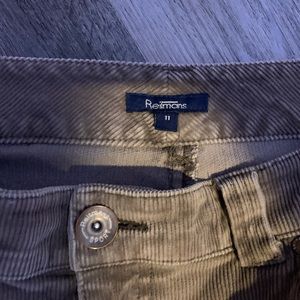 Beige tan corduroy flare pants,